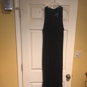 Full length sleek black evening gown